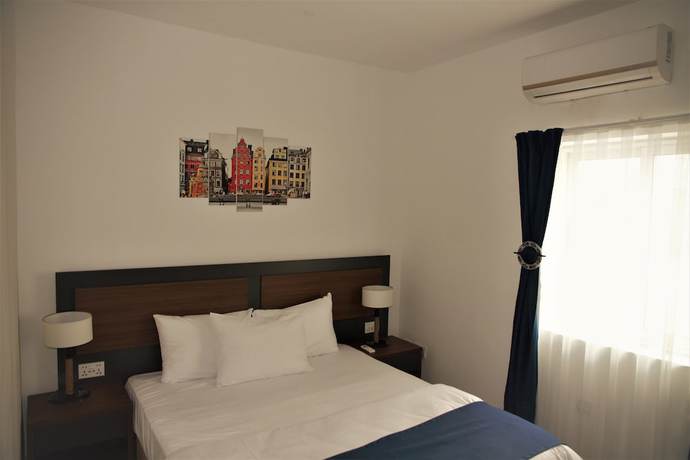Imagen de la habitación del Hotel Euro Homes. Foto 9