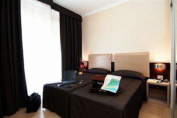 Imagen de la habitación del Hotel Euro House Rome Airport. Foto 4