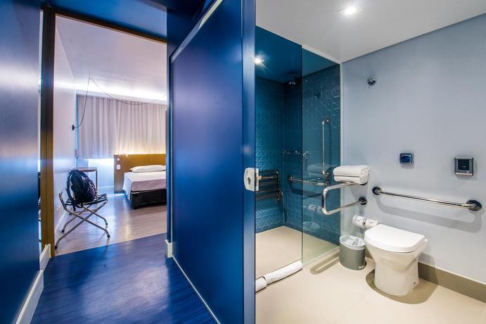 Imagen de la habitación del Hotel Euro Suíte Curitiba Batel. Foto 6