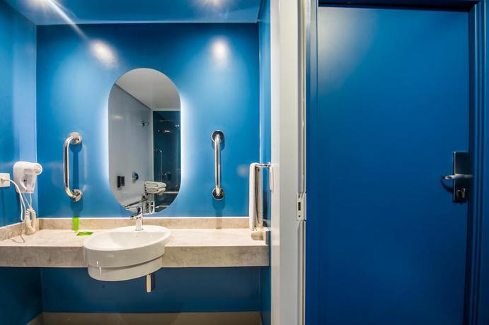 Imagen de la habitación del Hotel Euro Suíte Curitiba Batel. Foto 11