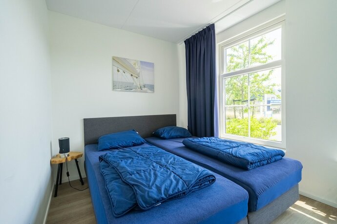Imagen de la habitación del Hotel EuroParcs Poort van Amsterdam. Foto 13