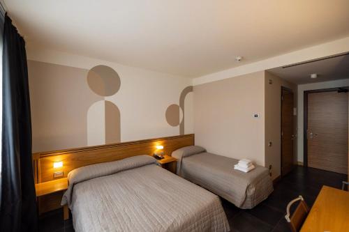 Imagen de la habitación del Hotel Europa Belluno. Foto 3