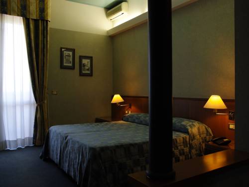 Imagen de la habitación del Hotel Europa, Cascina Confaloniera. Foto 2