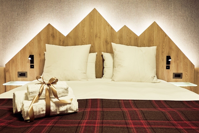 Imagen de la habitación del Hotel Europa, Cortina d'Ampezzo . Foto 3