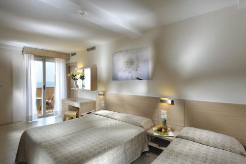 Imagen de la habitación del Hotel Europa, Lignano Sabbiadoro. Foto 8