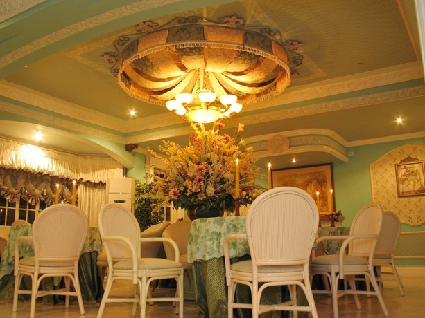 Imagen del bar/restaurante del Hotel Europa Mansionette Inn. Foto 1