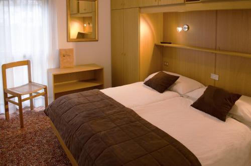 Imagen de la habitación del Hotel Europa, San Martino di Castrozza. Foto 8