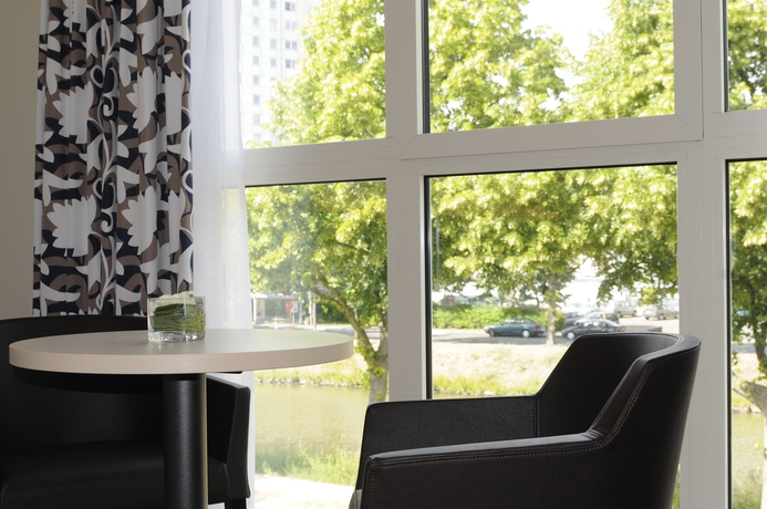 Imagen de la habitación del Hotel Europahotel Gent. Foto 7