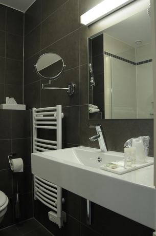 Imagen de la habitación del Hotel Europahotel Gent. Foto 9