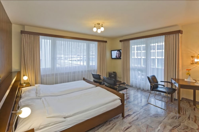 Imagen de la habitación del Hotel Europe Garni. Foto 16