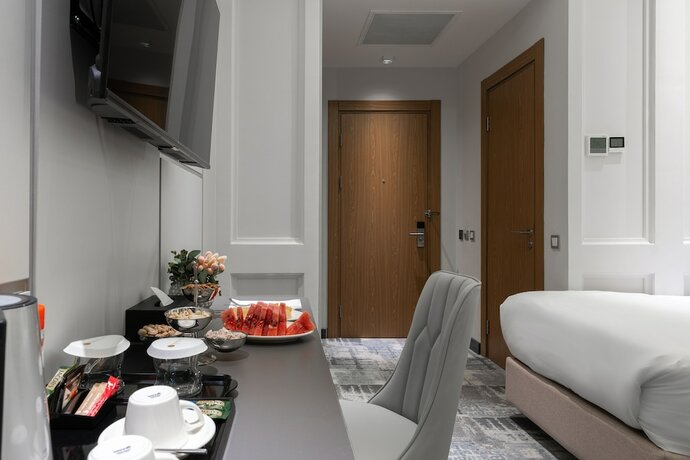 Imagen de la habitación del Hotel Europe, Taskent. Foto 14