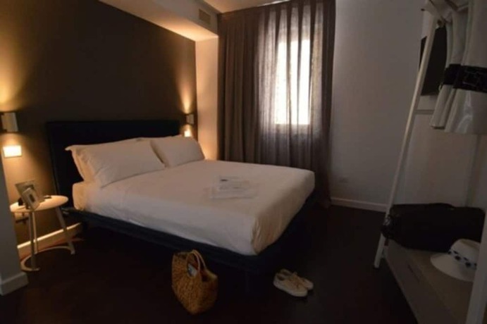 Imagen de la habitación del Hotel Eurostars Matera LaSuite. Foto 6