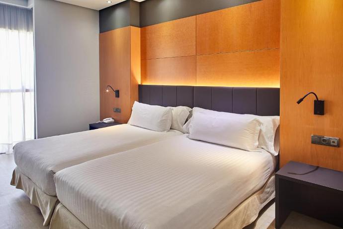 Imagen de la habitación del Hotel Eurostars Puerta Madrid. Foto 10