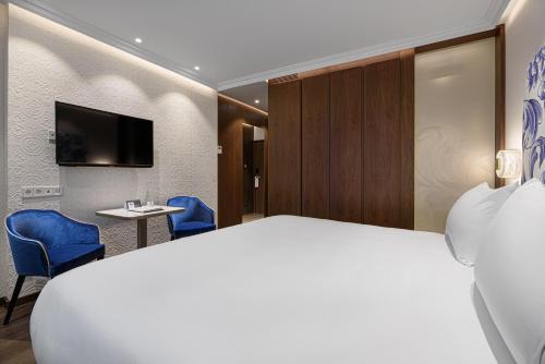 Imagen de la habitación del Hotel Eurostars Universal Lisboa. Foto 7