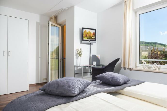 Imagen de la habitación del Hotel Eurostrand Resort Moseltal. Foto 19