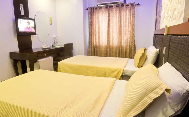 Imagen de la habitación del Hotel Eurotel Makati. Foto 3