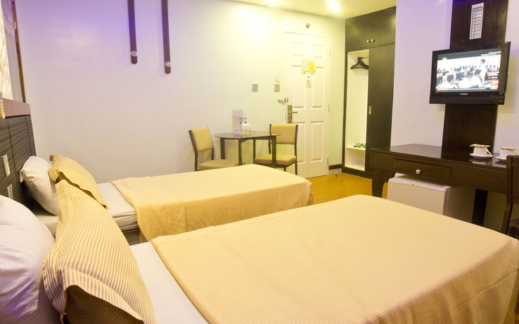 Imagen de la habitación del Hotel Eurotel Makati. Foto 4