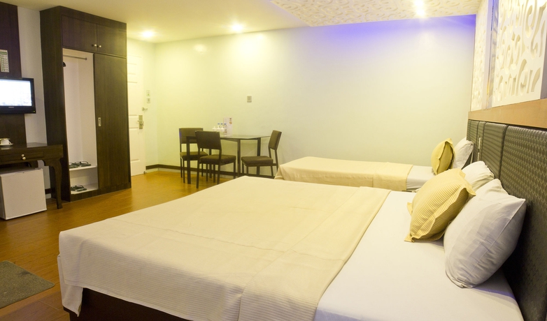 Imagen de la habitación del Hotel Eurotel Makati. Foto 16