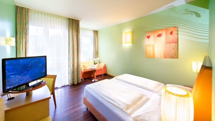 Imagen de la habitación del Hotel Eurothermenresort Paradiso 4s. Foto 7