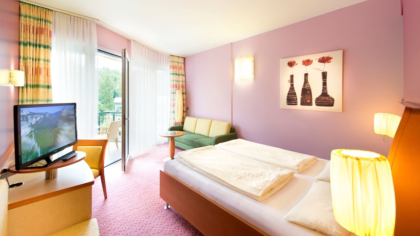 Imagen de la habitación del Hotel Eurothermenresort Paradiso 4s. Foto 11