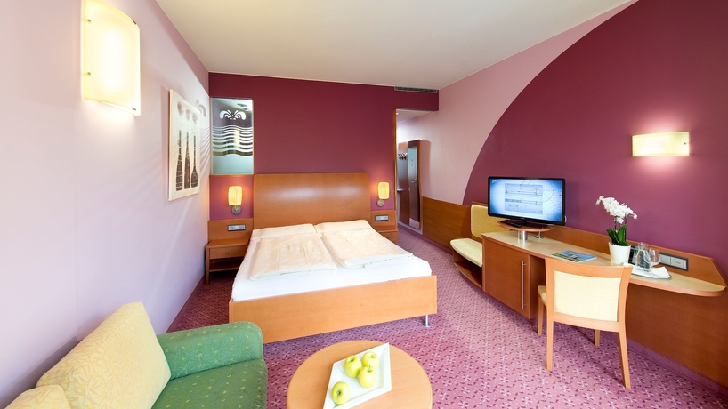 Imagen de la habitación del Hotel Eurothermenresort Paradiso 4s. Foto 14