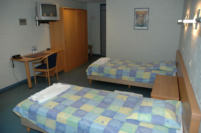 Imagen de la habitación del Hotel Eurovolleycenter. Foto 7