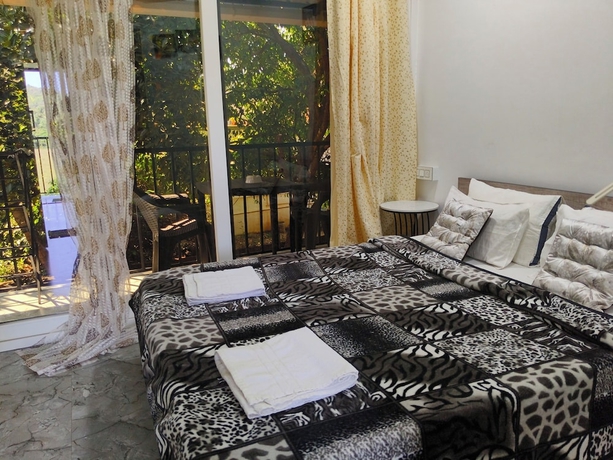 Imagen de la habitación del Hotel Eva Rooms 50 mtr From Ashwem Beach. Foto 3