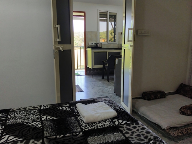 Imagen de la habitación del Hotel Eva Rooms 50 mtr From Ashwem Beach. Foto 13