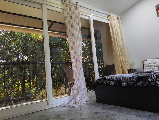 Imagen de la habitación del Hotel Eva Rooms 50 mtr From Ashwem Beach. Foto 14