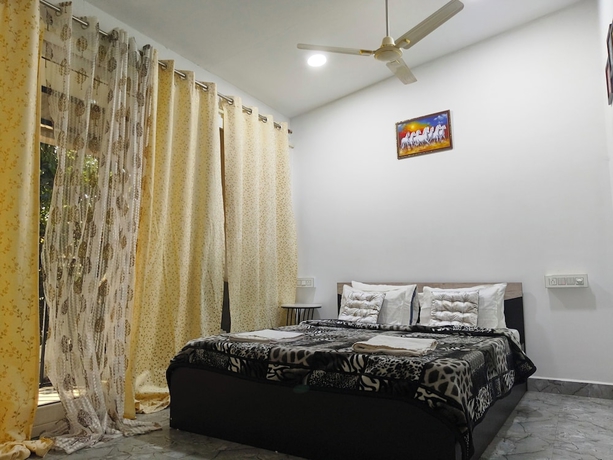 Imagen de la habitación del Hotel Eva Rooms 50 mtr From Ashwem Beach. Foto 16