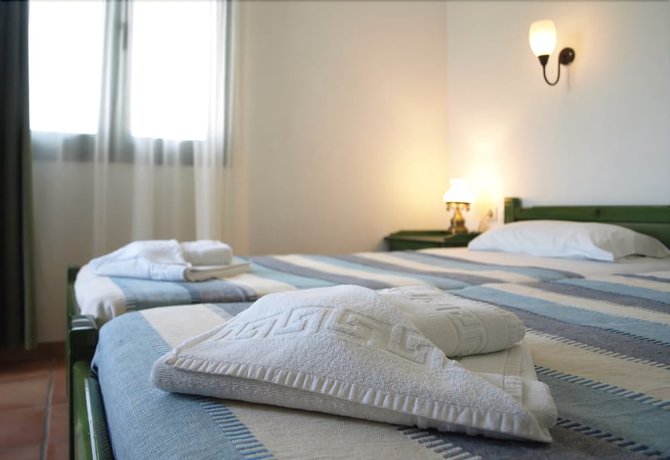 Imagen de la habitación del Hotel Eva Suites. Foto 7