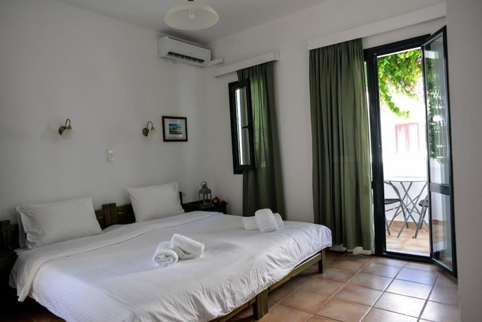 Imagen de la habitación del Hotel Eva Suites. Foto 12