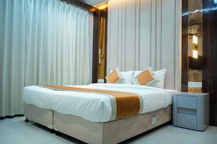 Imagen de la habitación del Hotel Evara Inn. Foto 11