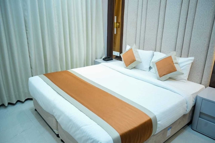 Imagen de la habitación del Hotel Evara Inn. Foto 12