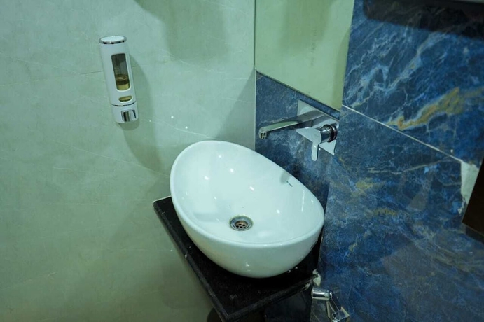 Imagen de la habitación del Hotel Evara Inn. Foto 14