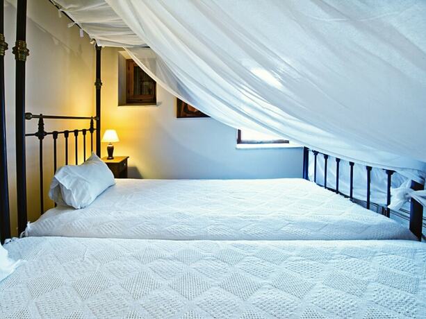 Imagen de la habitación del Hotel Eveleos Country House. Foto 16