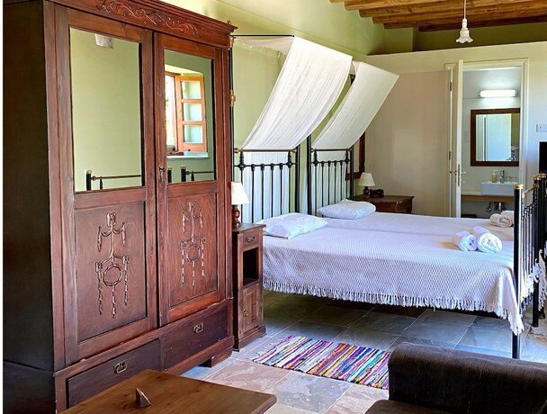 Imagen de la habitación del Hotel Eveleos Country House. Foto 20