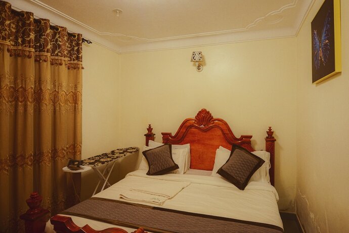 Imagen de la habitación del Hotel Evelyn Apartments. Foto 17