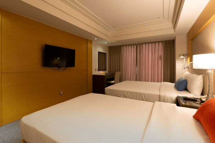 Imagen de la habitación del Hotel Ever Delightful Business. Foto 13