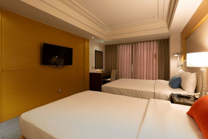 Imagen de la habitación del Hotel Ever Delightful Business. Foto 15
