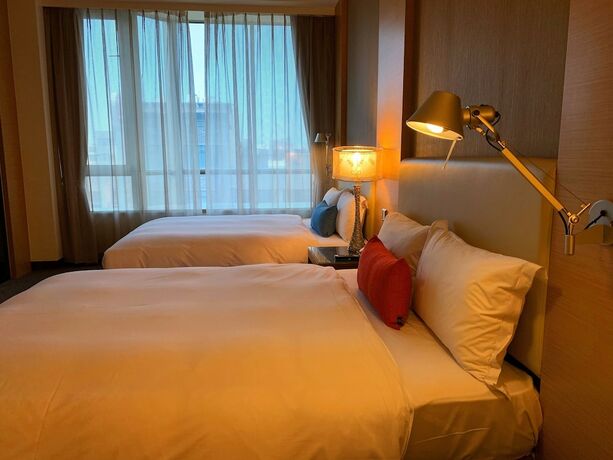 Imagen de la habitación del Hotel Ever Delightful Business. Foto 16
