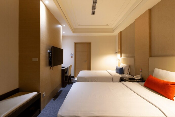 Imagen de la habitación del Hotel Ever Delightful Business. Foto 21