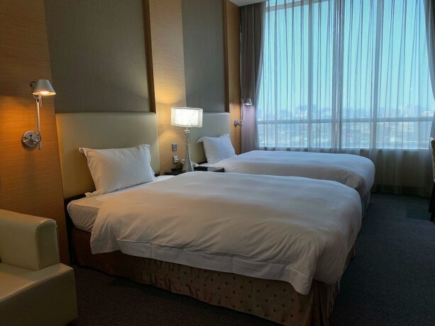 Imagen de la habitación del Hotel Ever Delightful Business. Foto 22