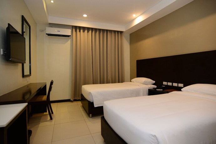 Imagen de la habitación del Hotel Ever O Business Hotel. Foto 9