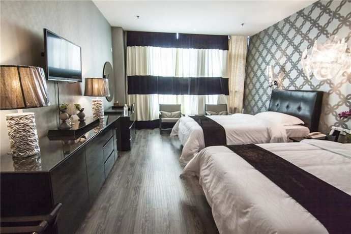 Imagen de la habitación del Hotel Everbright Business Hotel - Xiamen. Foto 8