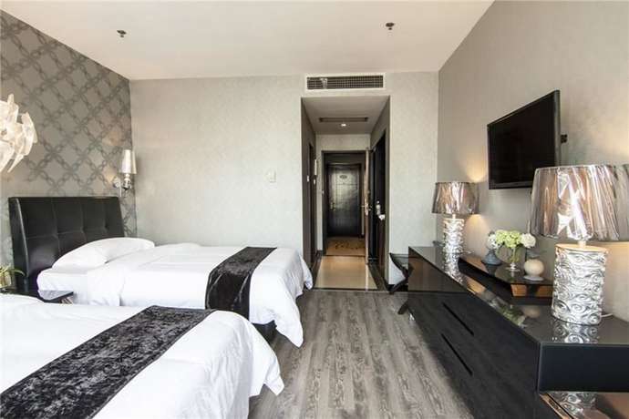 Imagen de la habitación del Hotel Everbright Business Hotel - Xiamen. Foto 9