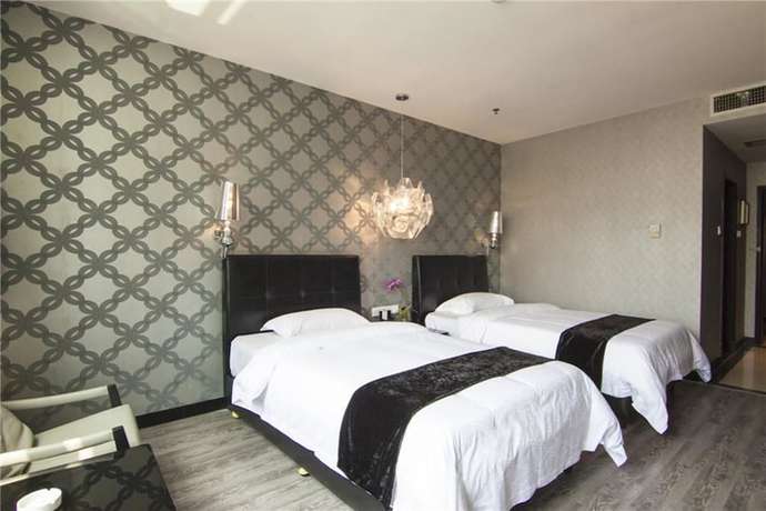 Imagen de la habitación del Hotel Everbright Business Hotel - Xiamen. Foto 10