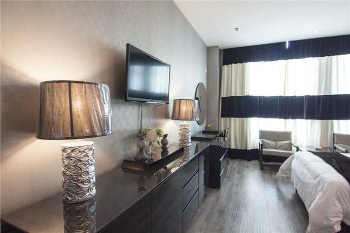 Imagen de la habitación del Hotel Everbright Business Hotel - Xiamen. Foto 13