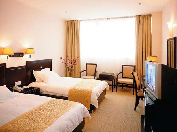 Imagen de la habitación del Hotel Everbright Business Hotel - Xiamen. Foto 15