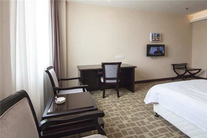 Imagen de la habitación del Hotel Everbright Business Hotel - Xiamen. Foto 16